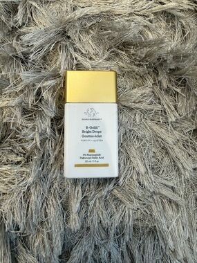 Drunk Elephant B-Goldi Bright Drops - White and Gold Bottle